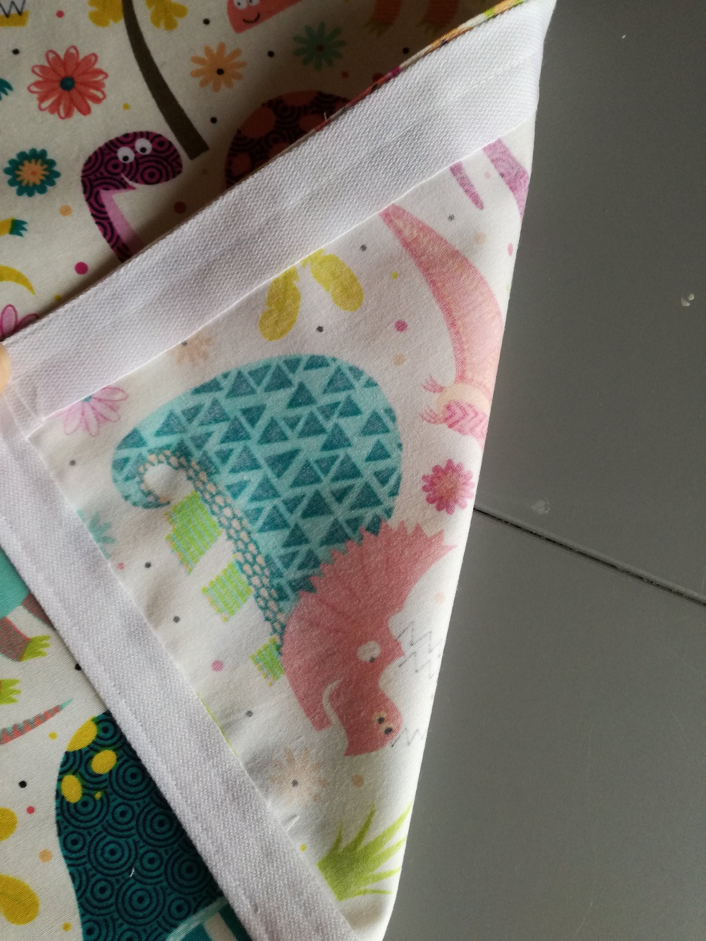 Handmade cotton dinosaur aprons. 