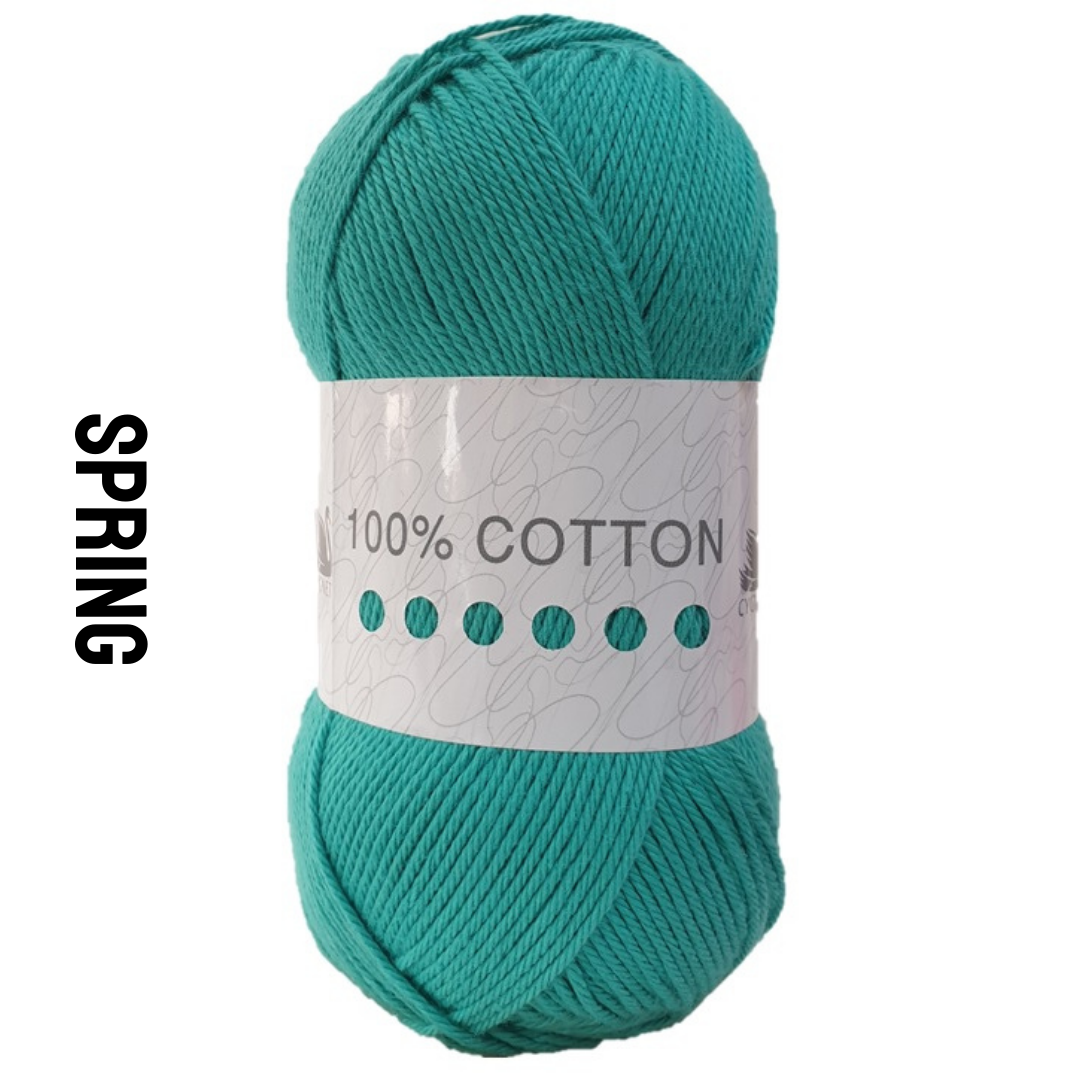 A spring blue/green ball of cotton yarn for knitting and crochet. 