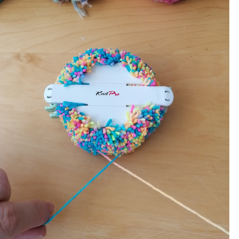 How to secure pom poms to stop them from falling apart.